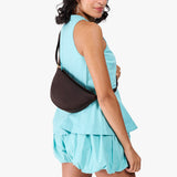 Moose Small | Model wearing petite half circle shaped sling bag