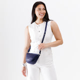 Cobalt Small | Model wearing petite half circle shaped sling bag