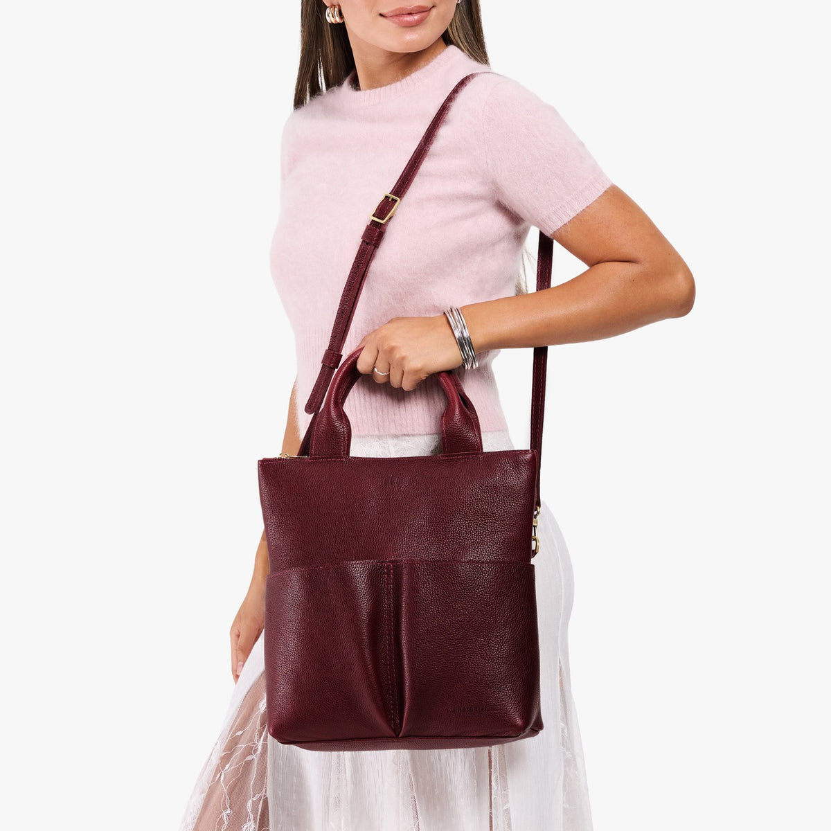 Cabernet*Small | Model wearing a convertible tote clutch crossbody