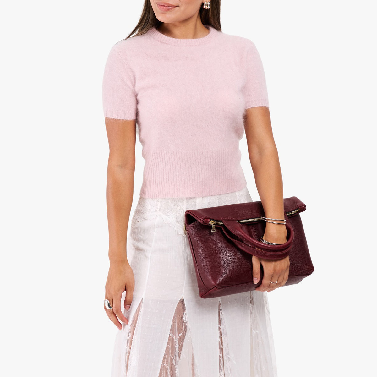 Cabernet*Small | Model wearing a convertible tote clutch crossbody