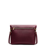 Cabernet Small | Convertible tote clutch crossbody with a back zipper pocket folded into a clutch