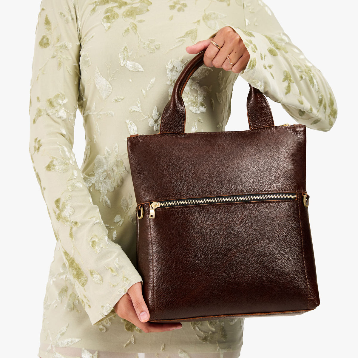Coldbrew*Small | Model wearing a convertible tote clutch crossbody