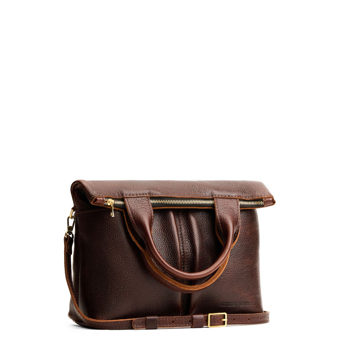 Coldbrew*Small | Convertible tote clutch crossbody with two large front pocket and top carry handles folded into a clutch