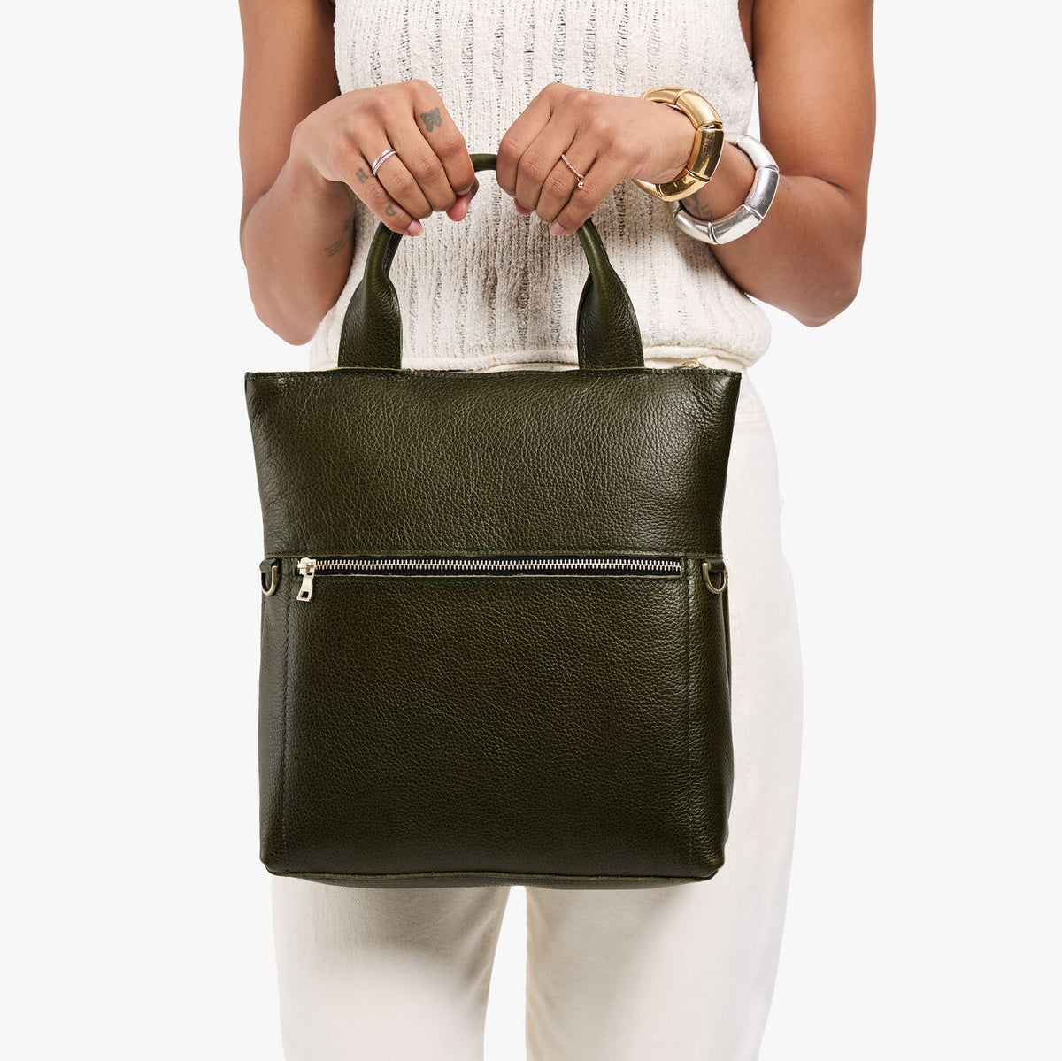 Pebbled Olive*Small | Model wearing a convertible tote clutch crossbody