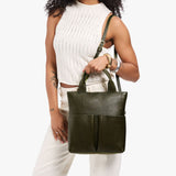 Pebbled Olive Small | Model wearing a convertible tote clutch crossbody