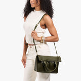 Pebbled Olive Small | Model wearing a convertible tote clutch crossbody