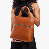 Sienna Small | Model wearing a convertible tote clutch crossbody