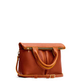 Sienna Small | Convertible tote clutch crossbody with two large front pocket and top carry handles folded into a clutch