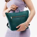 Sea Glass Small | Model wearing square slim leather tote backpack 