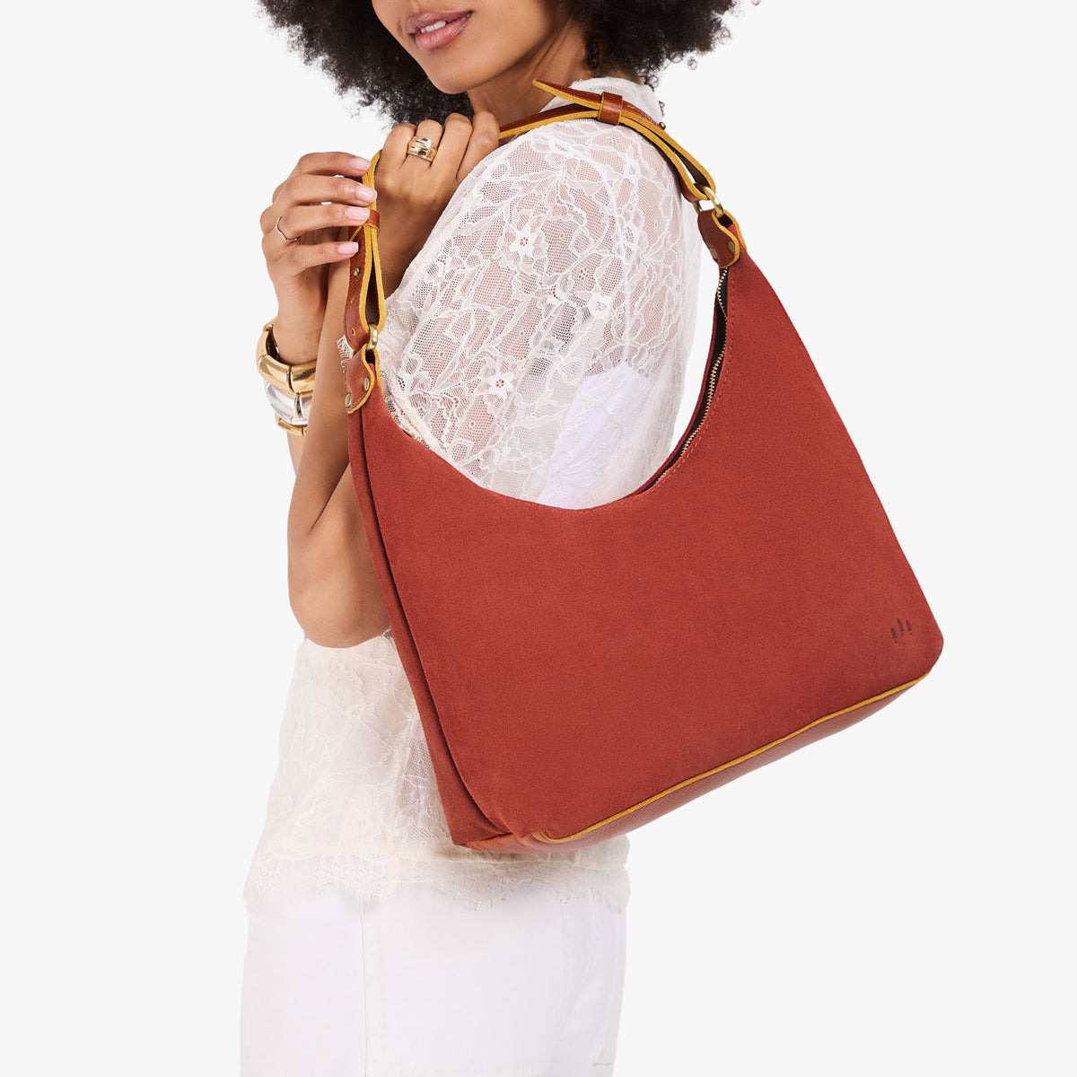 Cinnabar*Small*Classic | U-shaped shoulder bag with adjustable strap and fringe detail
