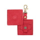 Cherry | Square-shaped leather AirTag holder with snap closure and swivel lobster claw clasp