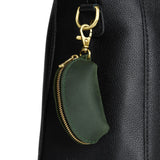 Evergreen | Taco shaped leather pouch with zipper and swivel lobster clasp on white background