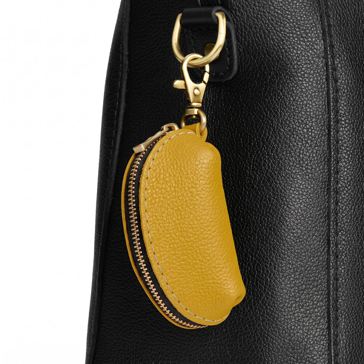 Pomello | Taco shaped leather pouch with zipper and swivel lobster clasp on white background