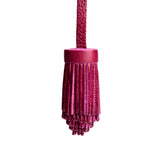 All Color: Orchid | Pom-pom style with tiered leather fringe