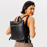 All Color: Black Classic | Model wearing square slim leather tote backpack