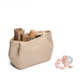 Oatmilk | Leather makeup bag with folded sides and zipper closure