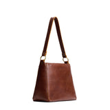 Asheville Classic | Triangular shoulder bag with antiqued brass finished hardware