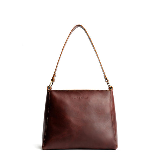 Cognac*Small | Triangular shoulder bag with antiqued brass finished hardware