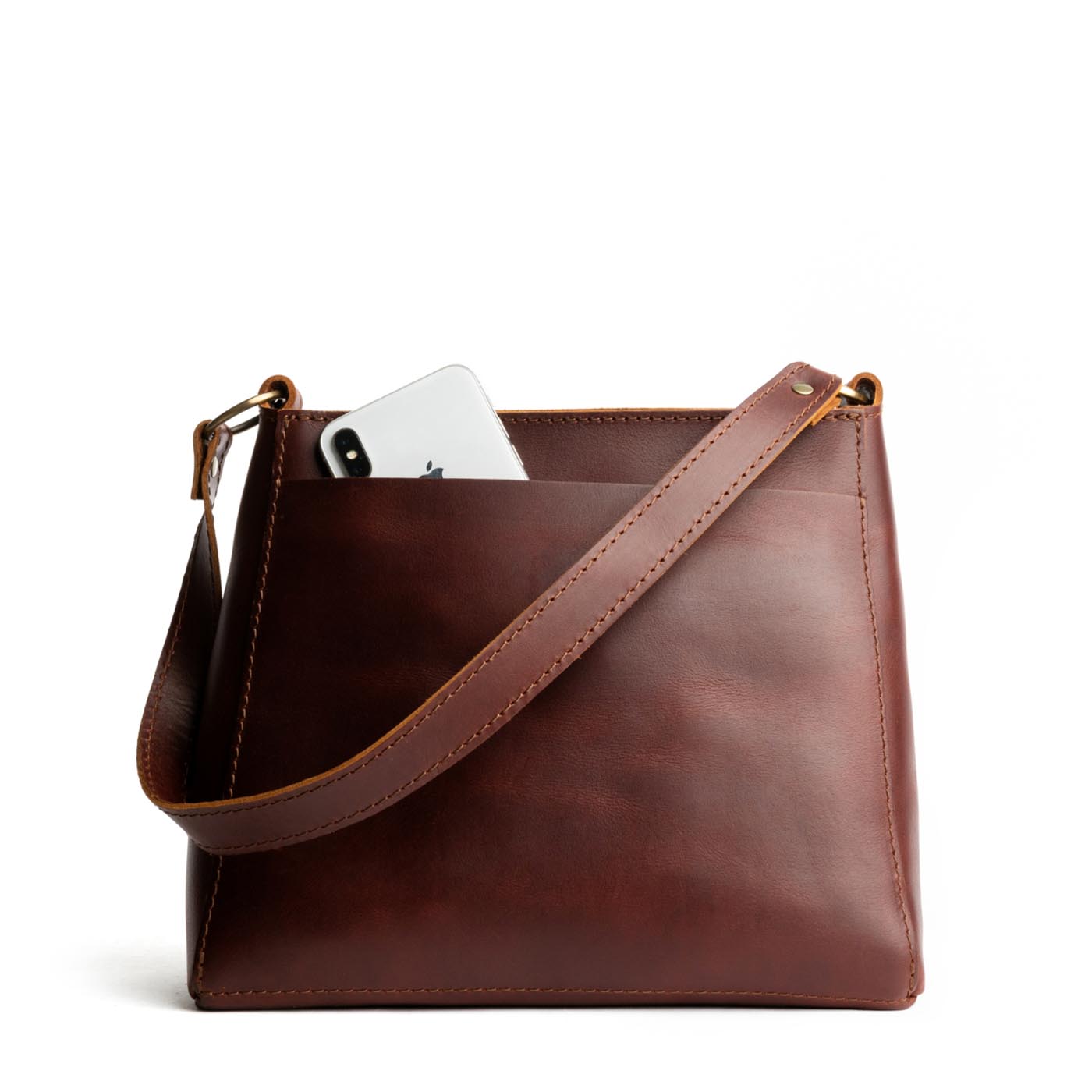 Cognac*Classic | Triangular shoulder bag with antiqued brass finished hardware
