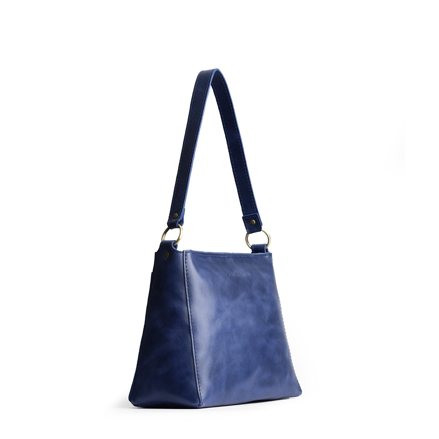 Cowboy Blue | Triangular shoulder bag with antiqued brass finished hardware
