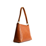 Honey Classic | Triangular shoulder bag with antiqued brass finished hardware