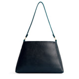 Boreal Large | Large triangular shoulder bag with antiqued brass finished hardware