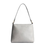 Nimbus Small | Triangular shoulder bag with antiqued brass finished hardware
