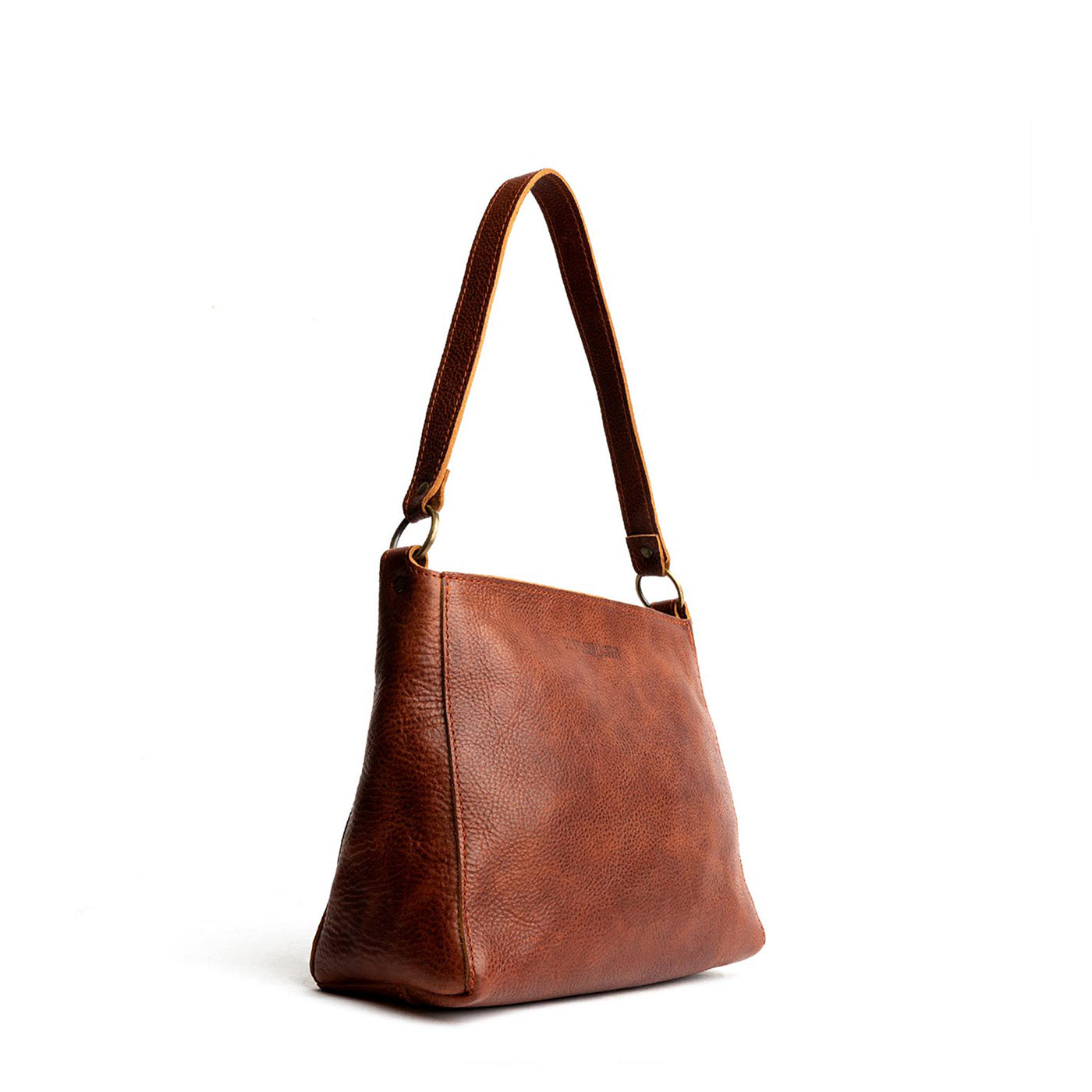 Nutmeg*Classic | Triangular shoulder bag with antiqued brass finished hardware