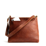 Nutmeg Classic | Triangular shoulder bag with antiqued brass finished hardware
