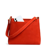 Paprika Small | Triangular shoulder bag with antiqued brass finished hardware