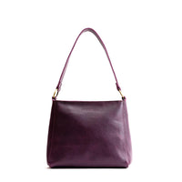 Plum*Classic | Triangular shoulder bag with antiqued brass finished hardware