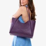 Empire Large | Model wearing a large rectangular tote bag