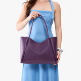 Empire Large | Model holding a large rectangular tote bag