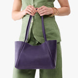 Empire Medium | Model holding midsize rectangular tote bag