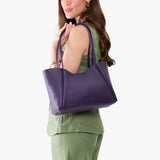 Empire Medium | Model holding midsize rectangular tote bag