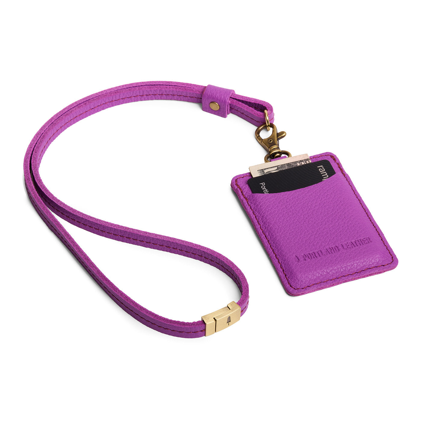 Cattleya | A leather lanyard attached to a matching card holder on a white background