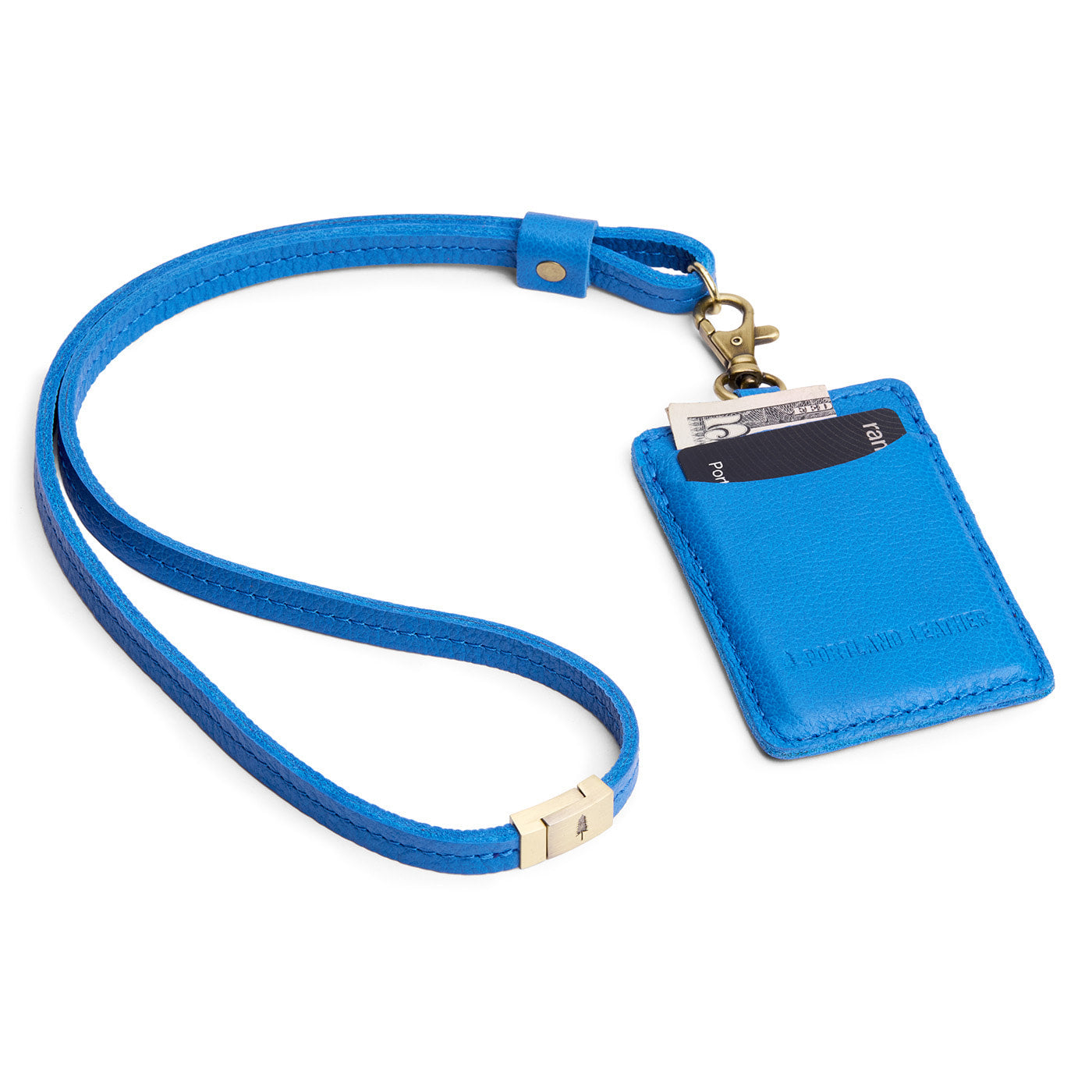 Skydive | A leather lanyard attached to a matching card holder on a white background